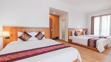 Family Quadruple Room | Premium bedding, minibar, in-room safe, individually decorated