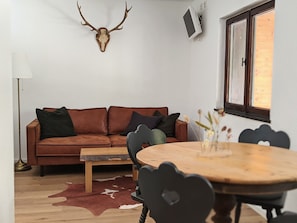 Apartamento família | Edredons de pluma, individualmente decorados, individualmente mobiliados