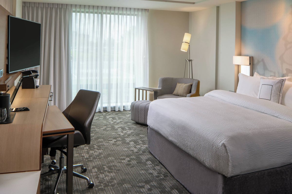 Room, 1 King Bed with Sofa bed | In-room safe, individually decorated, individually furnished, desk
