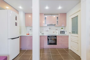 Design-Apartment, Mehrere Betten, Nichtraucher, Stadtblick | Eigene Küche | Kühlschrank, Mikrowelle, Ofen, Herdplatte