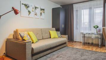 Familienapartment | Wohnbereich | Flachbildfernseher