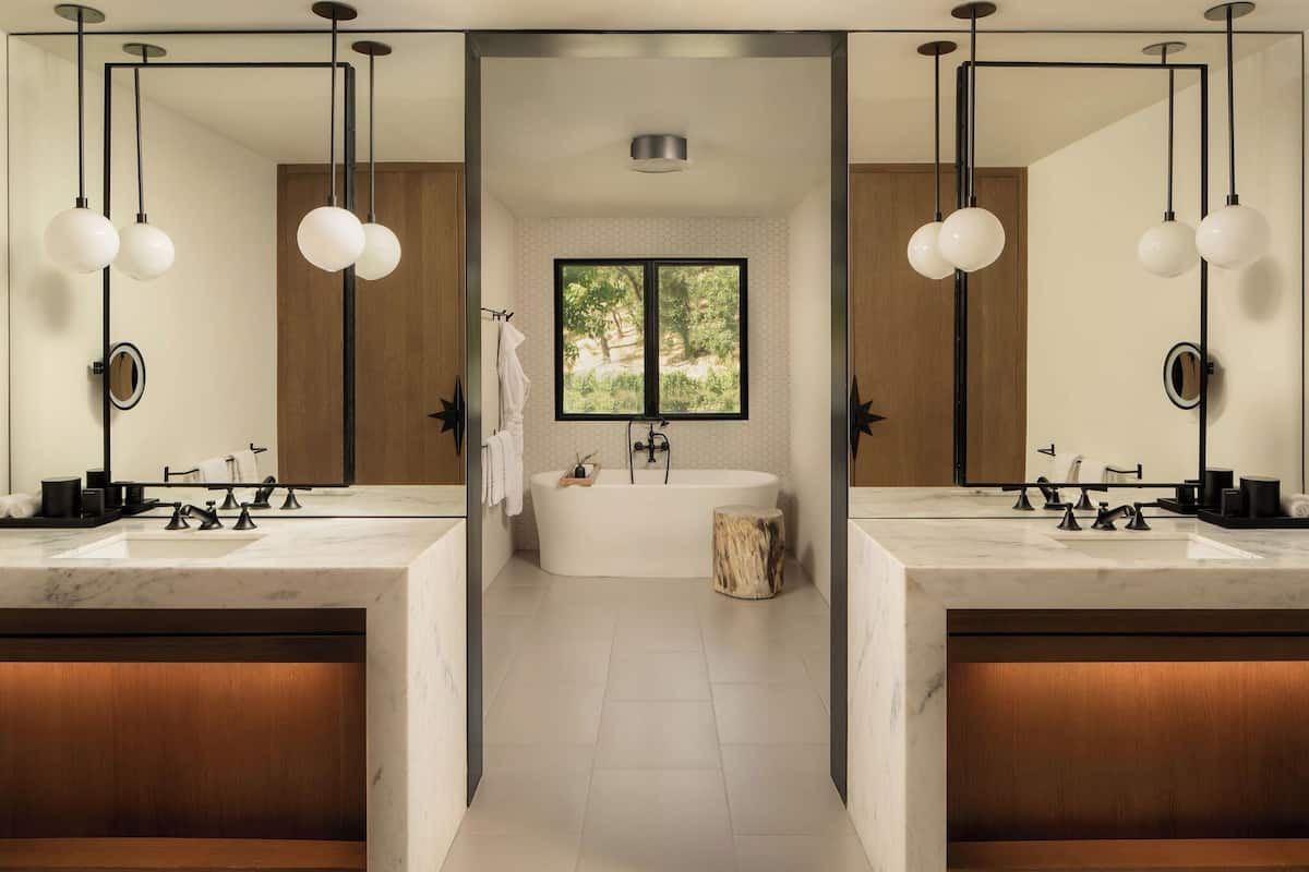 Separate bathtub and shower, designer toiletries, towels