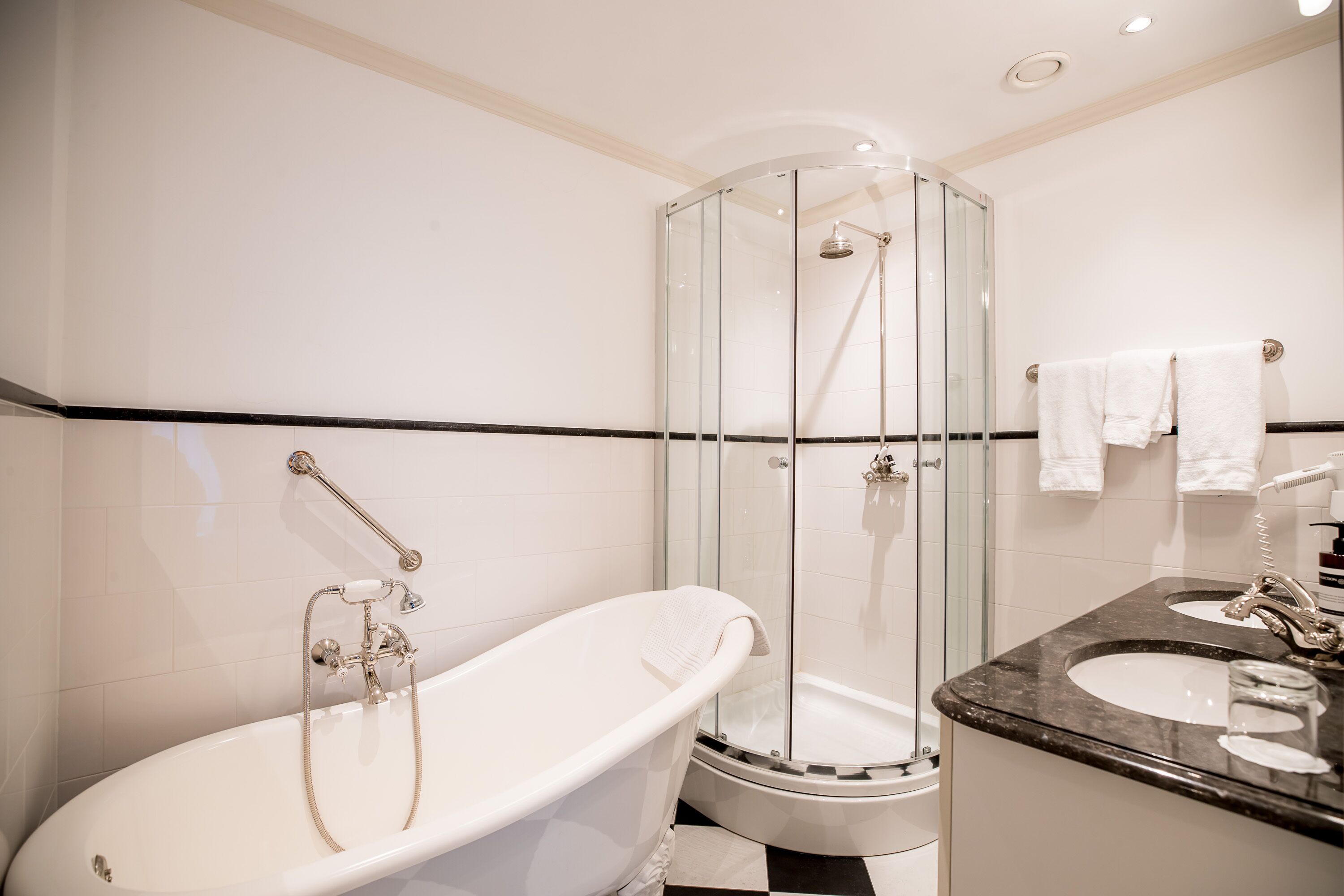luxury suite | bathroom | free toiletries, hair dryer, bathrobes, slippers