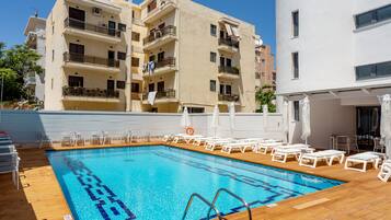 Seasonal outdoor pool, open 10:00 AM to 6:00 PM, sun loungers