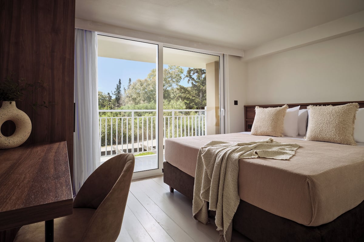 Two-Bedroom Maisonette with Garden View | Minibar, in-room safe, desk, iron/ironing board