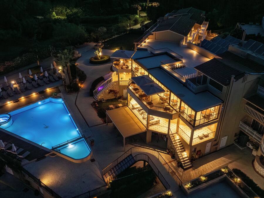 Outdoor pool, open 9:00 AM to 7:00 PM, pool umbrellas, pool loungers