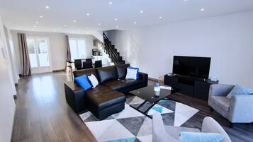 Penthouse | Living area | Flat-screen TV