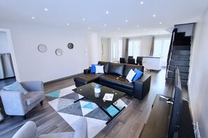 Penthouse | Living area | Flat-screen TV