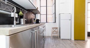 Apartment, 1 Bedroom | Private kitchen | Fridge, oven, stovetop, cookware/dishes/utensils - JOIVY Loft Naviglio (Milan)