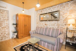 Toetasjesleilighet – city, 1 soverom | Oppholdsrom | Flatskjerm-TV