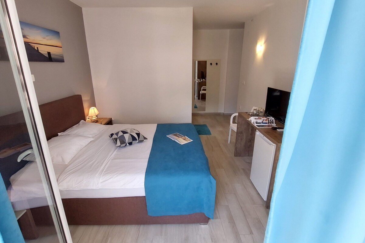 Desk, iron/ironing board (on request), WiFi (free)
