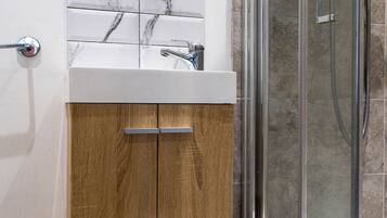 Standard Twin Room, 2 Single Beds | Bathroom | Shower, hair dryer, towels