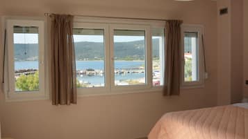 Deluxe Apartment, 3 Bedrooms, Sea View | Premium bedding, pillowtop beds, in-room safe, desk