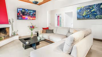 Apartment, Terrace | Living area | Flat-screen TV, heated floors