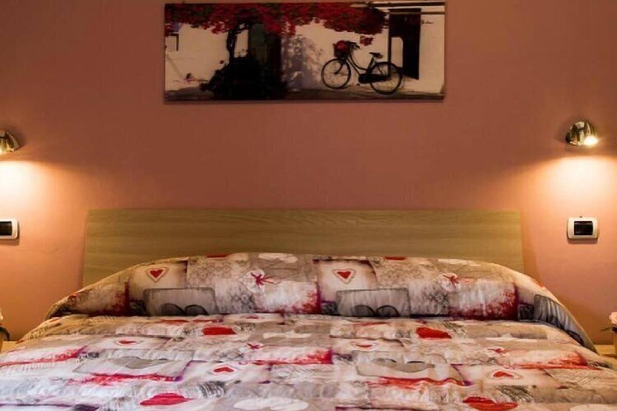 Triple Room, Private Bathroom (external) | Minibar, soundproofing, WiFi (free), bed sheets