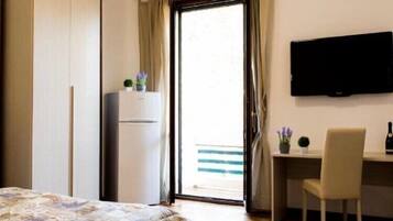 Chambre Quadruple Deluxe, salle de bains attenante | Minibar, chambres insonorisées, Wi-Fi gratuit, draps fournis