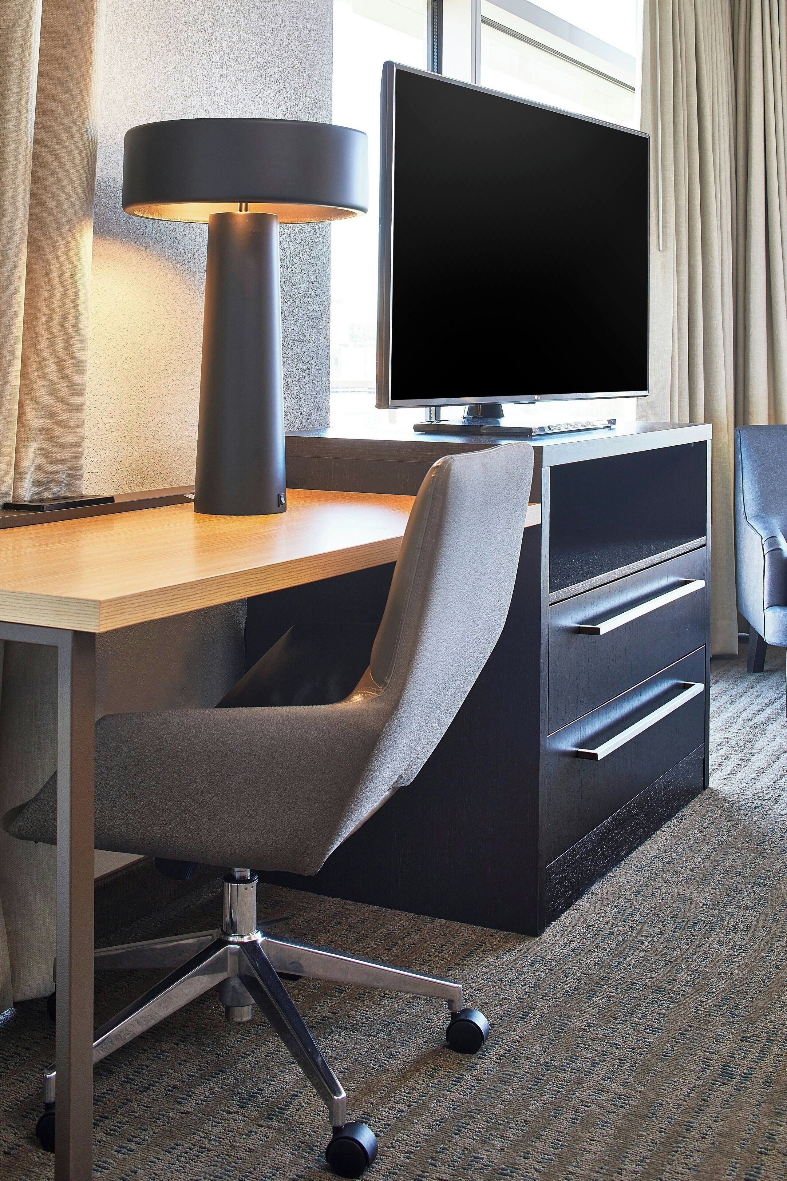 room, 1 king bed with sofa bed, corner | 1 bedroom, desk, laptop workspace, iron/ironing board