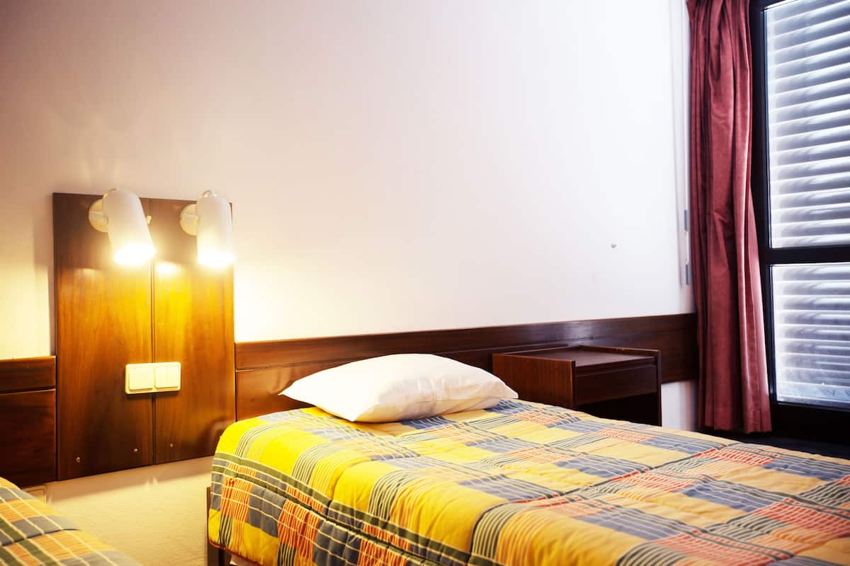 Habitación individual, baño privado | Wifi gratis y ropa de cama