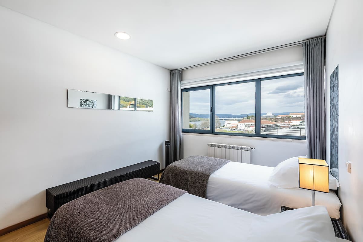 Twin Room, River View | 20 bedrooms, blackout drapes, free WiFi, bed sheets