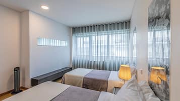 20 bedrooms, blackout curtains, free WiFi, bed sheets