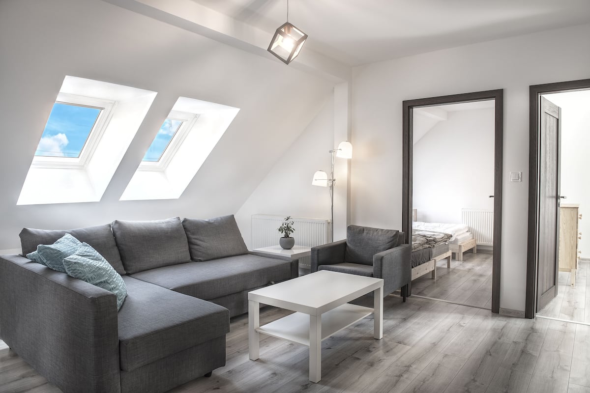 Apartamento família | Sala de estar | TV de tela plana