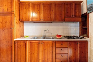 Exclusive Apartment, 1 Bedroom, Ground Floor | Private kitchen | Fridge, stovetop, coffee/tea maker, electric kettle