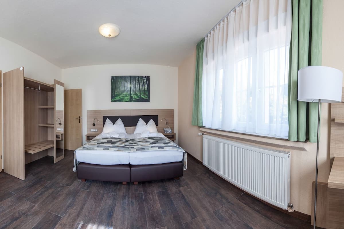 Iron/ironing board (on request), cribs (free), WiFi (free), bed sheets