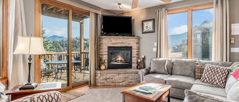 Condo, 2 Bedrooms | Living area | Flat-screen TV