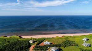 On the beach, beach towels - Beachfront Cottage Located In Amazing Thunder Cove (Kensington)