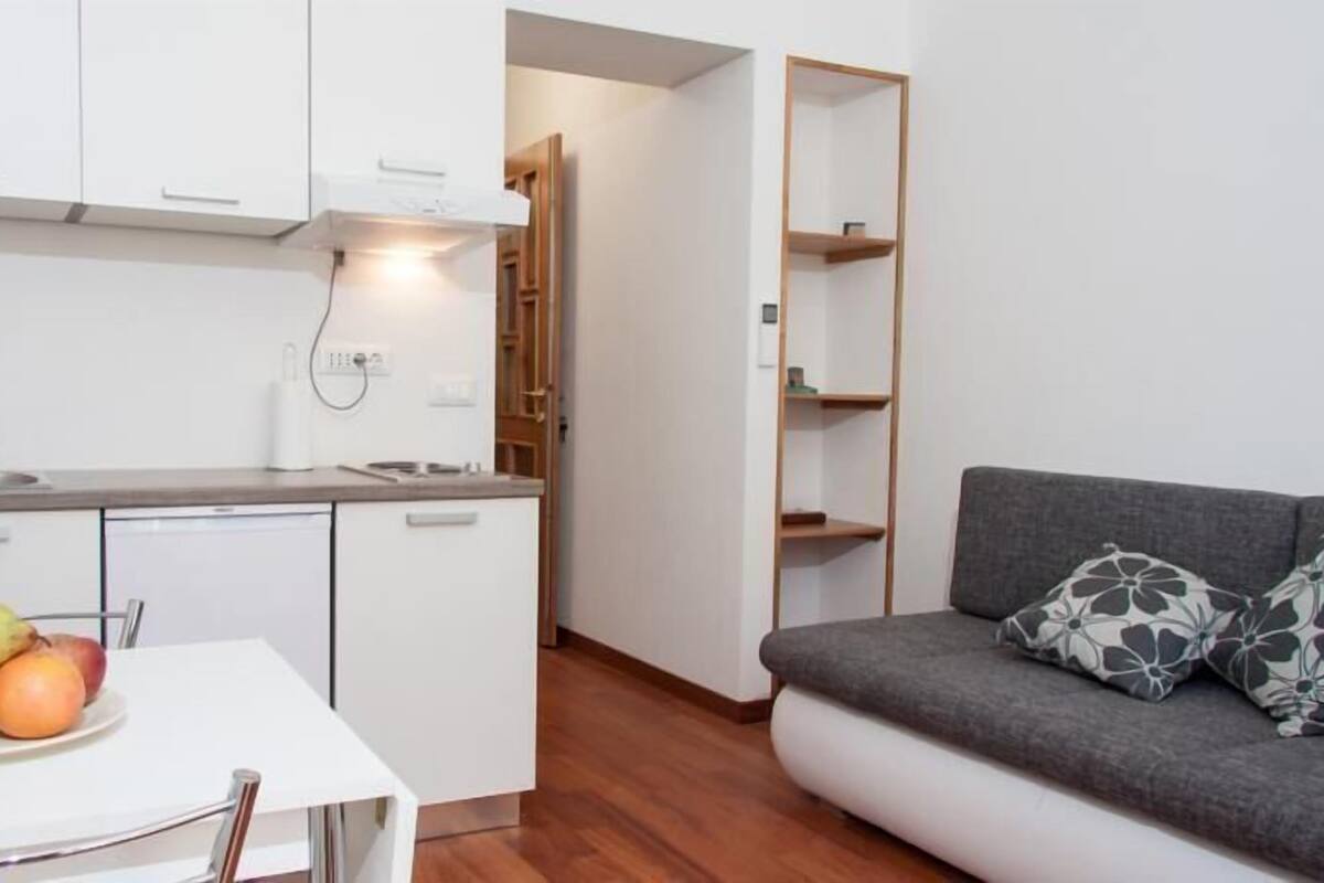 Superior Studio | Living area | Flat-screen TV