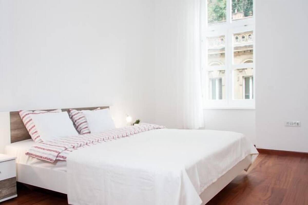 Apartment, 1 Bedroom, Balcony | Iron/ironing board, WiFi (free), bed sheets