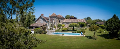 Seasonal outdoor pool, open 10:00 AM to 8:30 PM, pool umbrellas