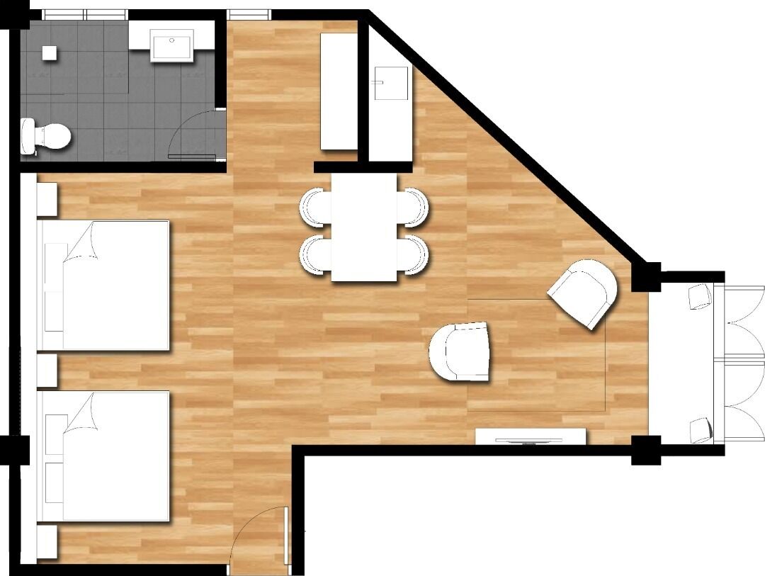 A floor plan of a hotel room with a bathroom, a dining area with a table and chairs, and a seating area with a sofa and armchairs.