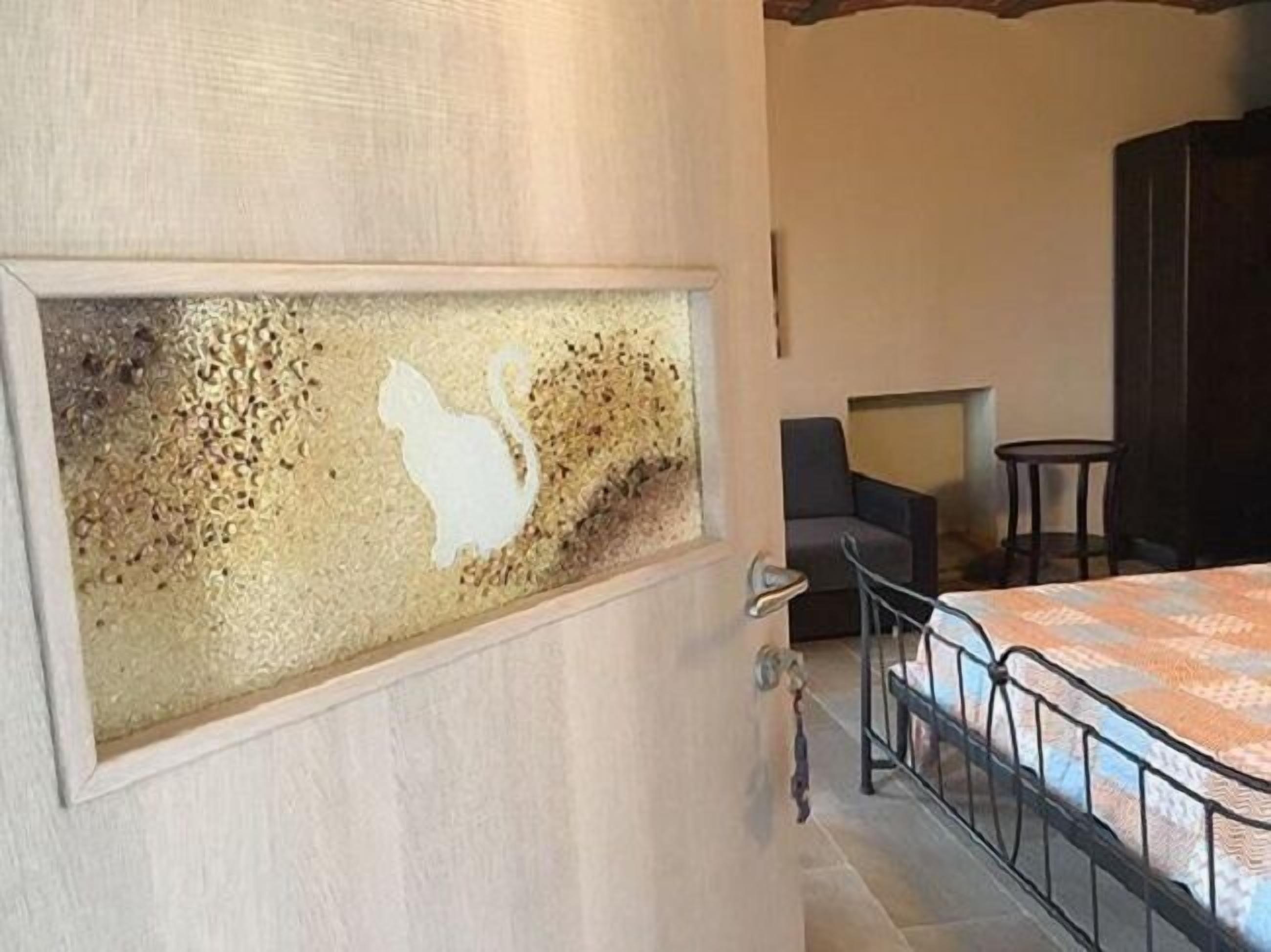 Double Room, Patio, Pool View (Gatto) | Individually furnished, desk, laptop workspace, free cribs/infant beds