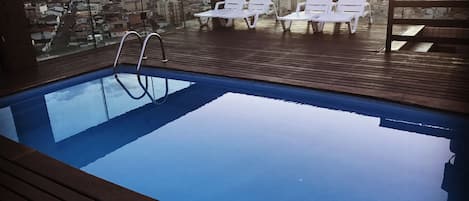 Outdoor pool, pool loungers