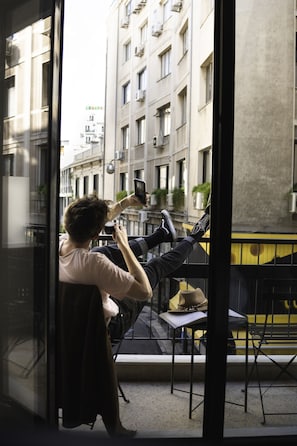 Suíte júnior, sacada, vista para a cidade | Terraço/pátio