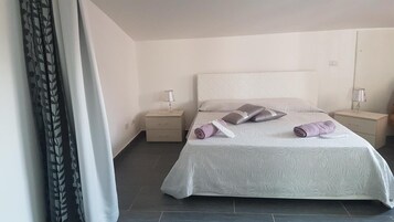1 habitación, cubrecamas y colchones con efecto memoria