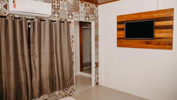 Blackout drapes, iron/ironing board, free WiFi, bed sheets