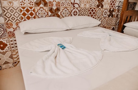 Blackout curtains, iron/ironing board, free WiFi, bed sheets