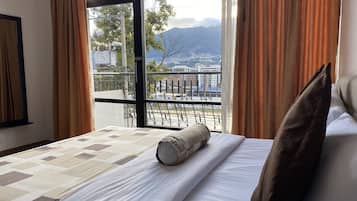 Deluxe Room, 1 Queen Bed, Mountain View | Minibar, in-room safe, individually furnished, desk