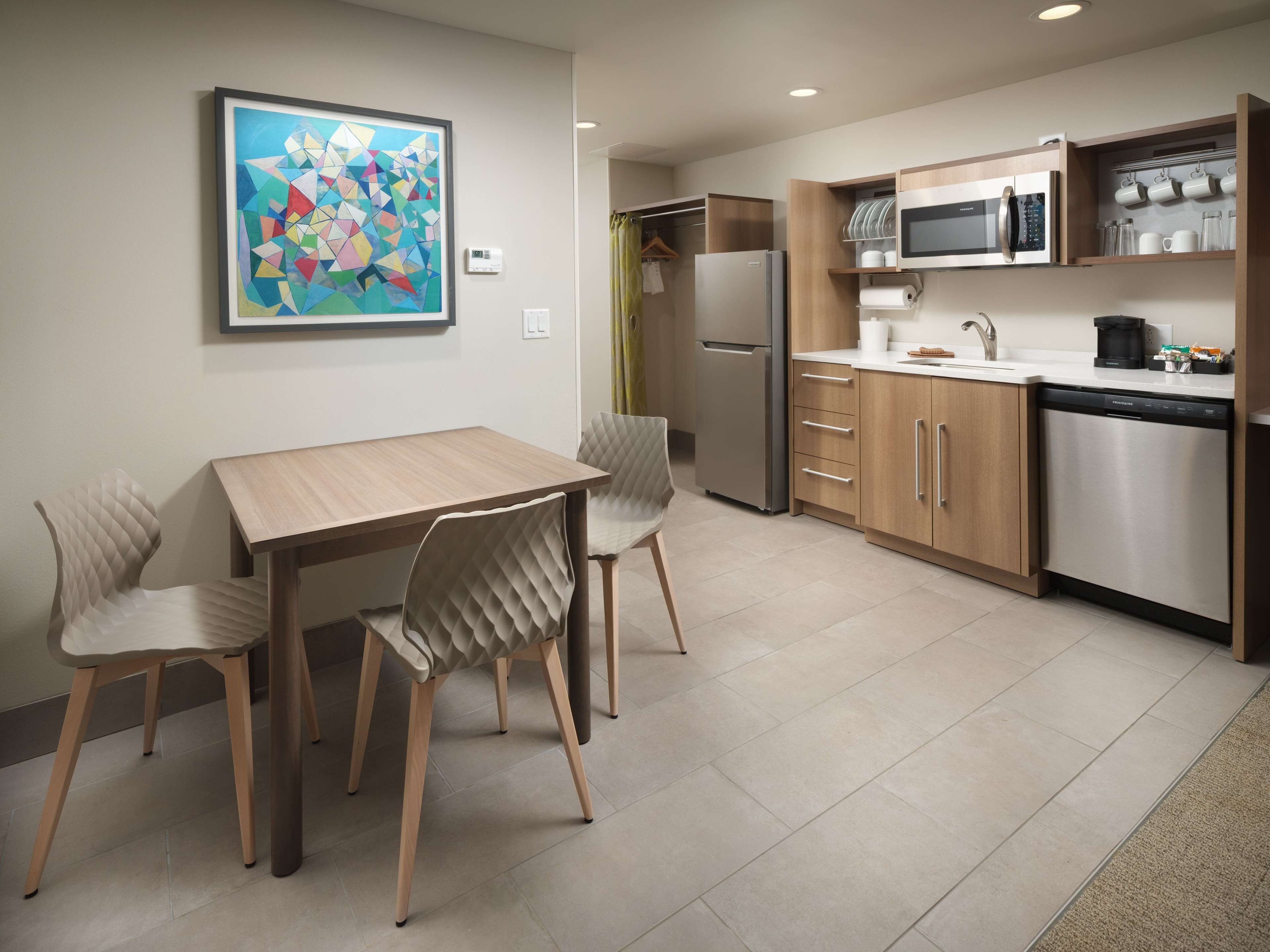 full-sized fridge, microwave, dishwasher, coffee/tea maker