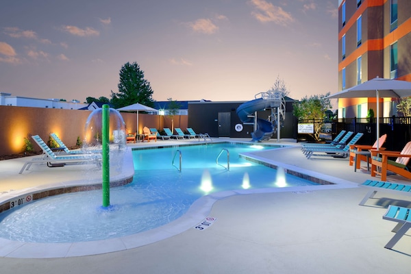 Seasonal outdoor pool, open 11:00 AM to 8:00 PM, pool umbrellas