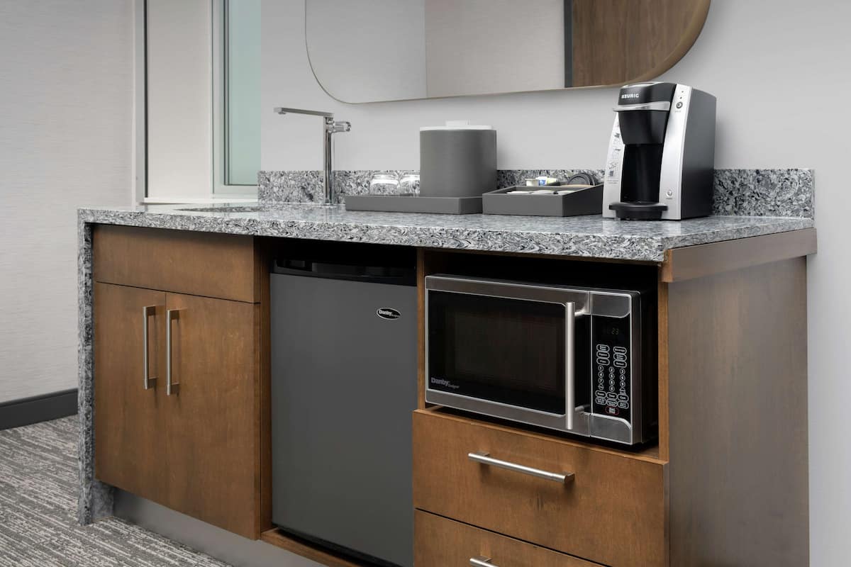 premium bedding, desk, blackout curtains, iron/ironing board