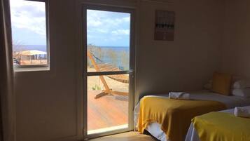 Superior Apartment, Ocean View | Minibar, in-room safe, free WiFi, bed sheets