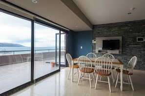 Apartment (Krund) | Living area | 32-inch LED TV with cable channels, pay films, offices