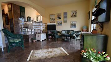 Villa, Sea View | Living area | Flat-screen TV