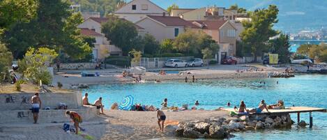 Beach nearby, sun loungers