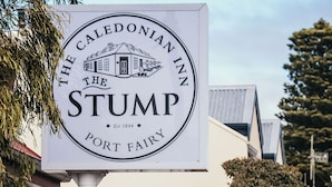 A sign for The Caledonian Inn Stump, indicating it is a historic establishment since 1844. - The Caledonian Inn (Port Fairy)