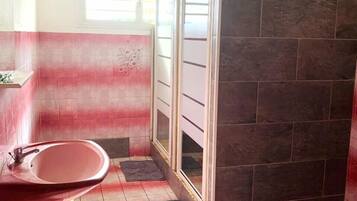 Shower, rainfall showerhead, hair dryer, towels