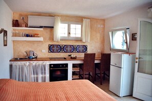 1 dormitorio, caja fuerte, tabla de planchar con plancha y wifi gratis